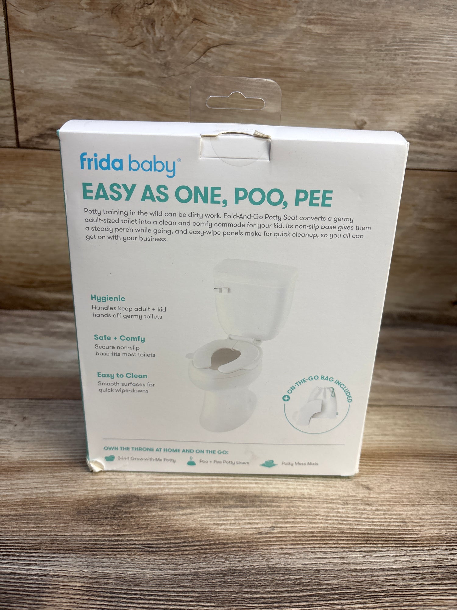 Frida Baby Fold-And-Go Potty Seat - White