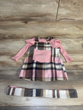 Girls plaid jumper dress with pink long sleeve shirt and matching headband on wood floor