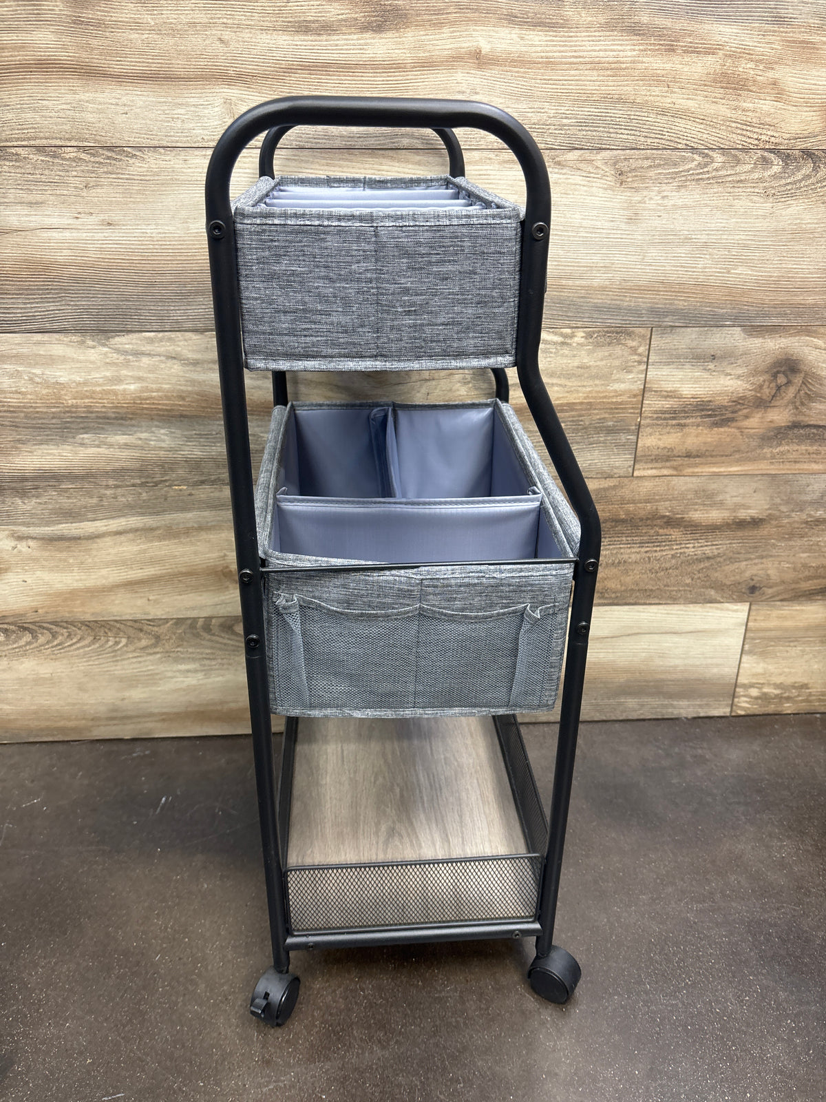 Front view of 3-tier baby diaper caddy organizer and storage cart showcasing gray fabric bins and caster wheels