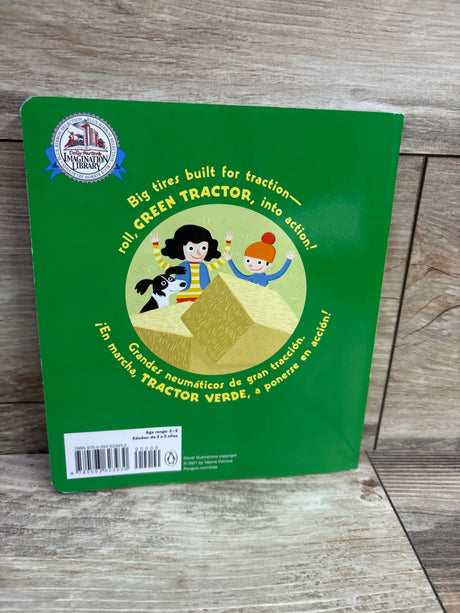 Back cover of Green Tractor Tractor Verde paperback book showing children and a dog on hay bales with traction text