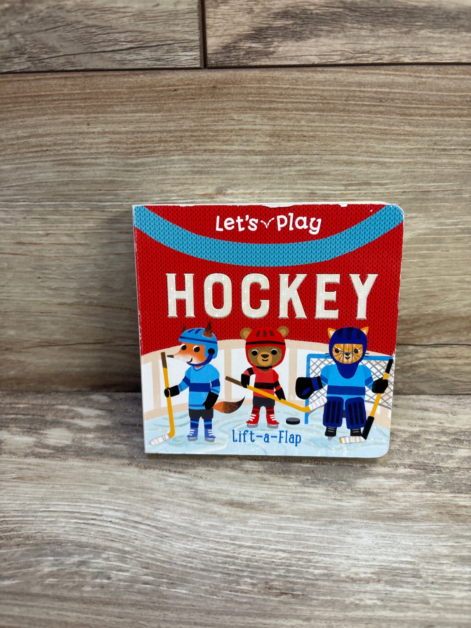 Let's Play Hockey! A Lift-a-Flap Board Book
