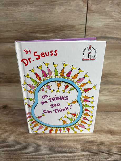 Dr. Seuss children's book Oh, the Thinks You Can Think! on wood surface, featured in kids resale store