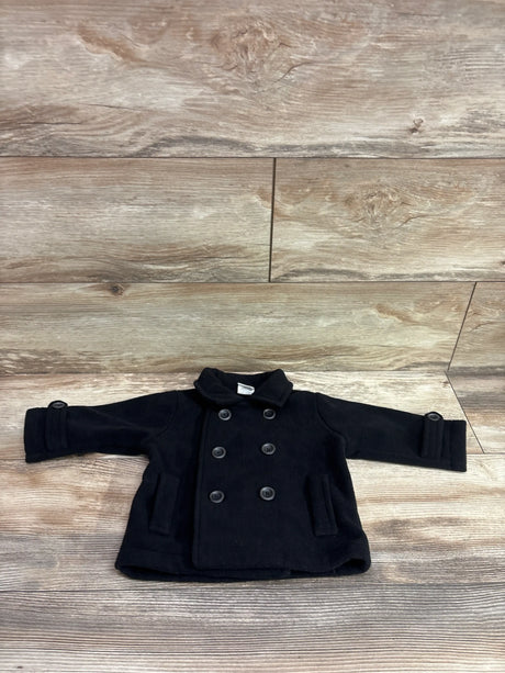 Front view of black fleece peacoat in size 9m showcasing double-breasted buttons and side pockets on a wood-look floor
