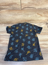 Kids dark gray t-shirt with blue and yellow snake print pattern on wooden background