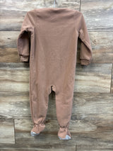 Back view of Carter’s brown walrus blanket sleeper in size 2T showcasing footed legs and long sleeves on a wood plank background