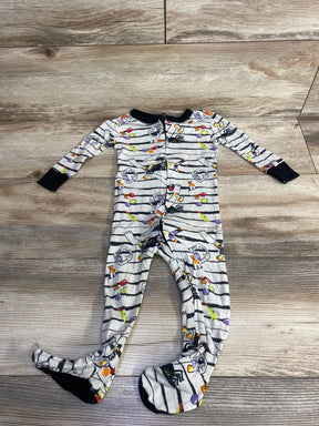 Halloween-themed baby footed pajamas with candy and spider print, perfect for kids' sleepwear