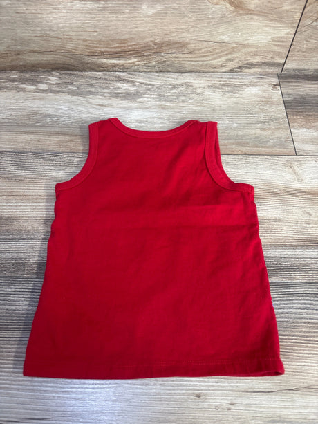 Back view of red toddler tank top showing sleeveless crew neck and straight hem on wood floor background