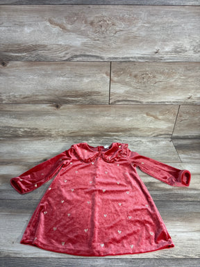 Red velvet baby dress with long sleeves, ruffled collar, and small silver heart patterns