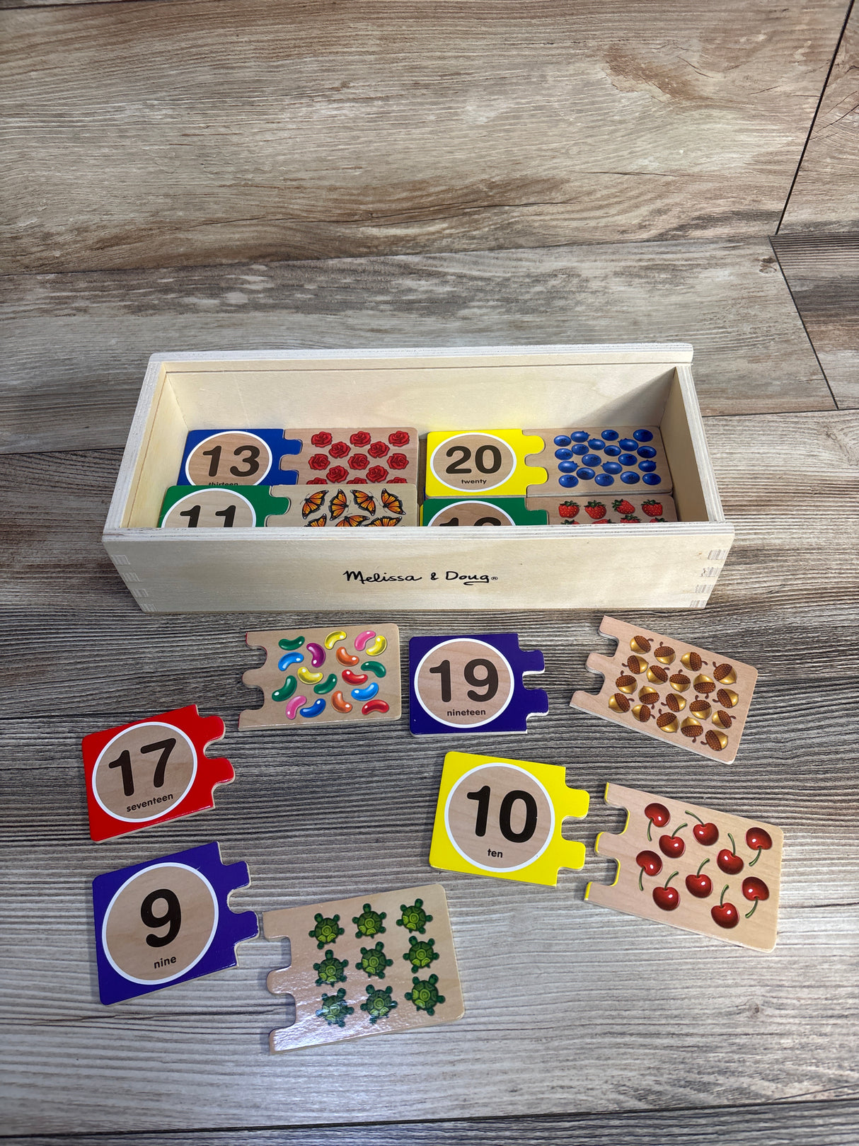 Melissa & Doug Self-Correcting Wooden Number Puzzles With Storage Box