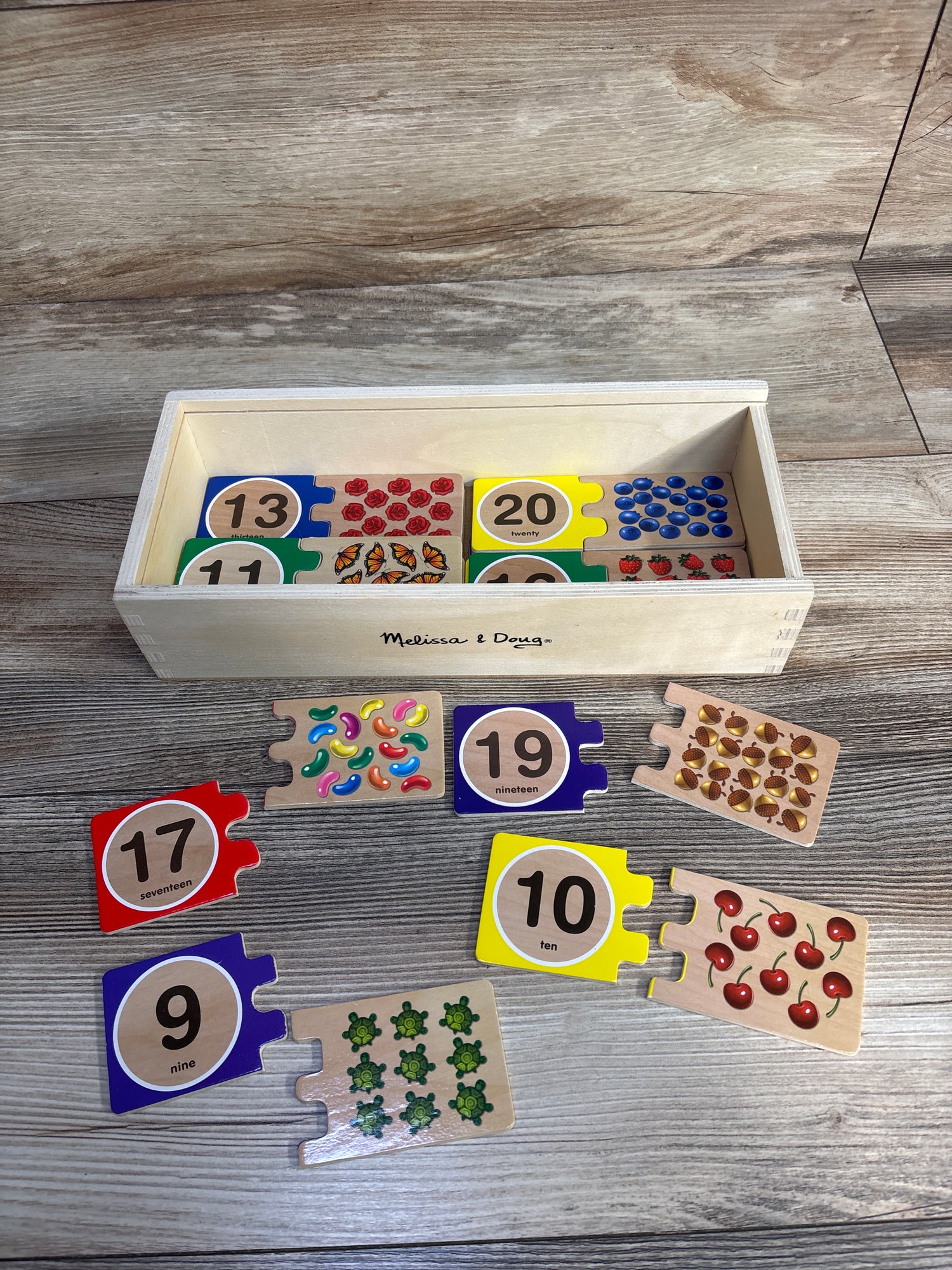 Melissa & Doug Self-Correcting Wooden Number Puzzles With Storage Box