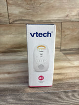 Front of VTech DM111 monitor box showing VTech logo and unit image with five-level sound indicator on wood