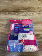 Top-down view of Hanes 14-pack girls' bikini underwear showcasing assorted pink, purple, and white prints and the packaging label on a wood surface
