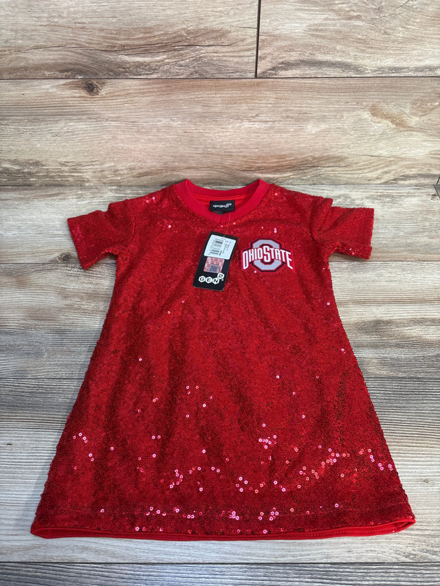 Red sequined toddler dress with Ohio State logo, laid flat on wood floor.