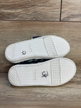 TOMS kids shoes with white soles and navy shark print, perfect for little feet