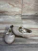 Angled front view of Koala Kids gold glitter bow ballet flats, size 3C, showing glitter finish and ribbon bow on wood background