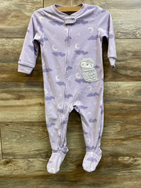 Front view of Carter’s purple blanket sleeper showcasing full-length zipper, footed legs, and owl detail with a wood background