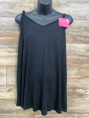Black maternity nursing tank top with lace trim on mannequin against wood background