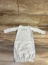 Flat lay of grey Simple Joys newborn gown showing long sleeves, LOVED chest embroidery, and elasticized bottom on wood floor