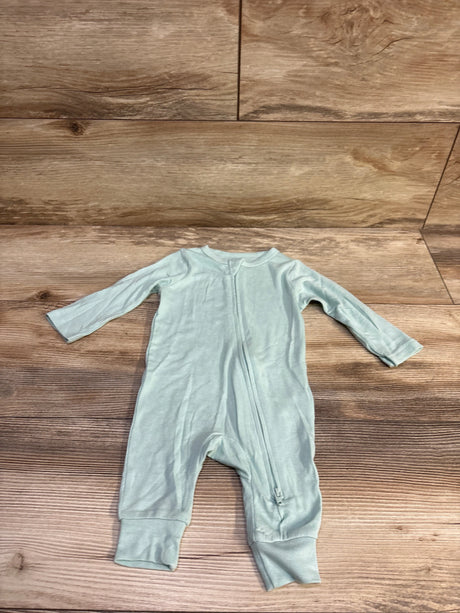 Front view of Cloud Island modal baby sleeper in sage green with long sleeves, zip front, and fold-over cuffs on wood background