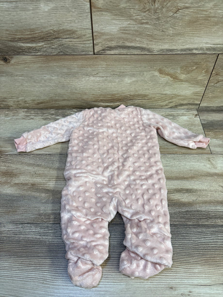 Back view of Kyle & Deena Minky Dot footed sleeper showcasing pink raised dot minky texture and ribbed cuffs on wood floor background