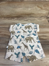 Flat lay of Little Planet beige shortie romper (3 months) showing safari animal print and short sleeves on wood background