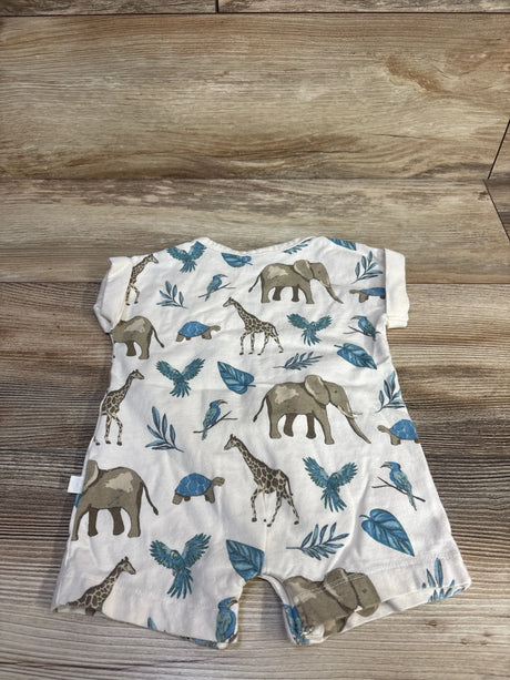 Flat lay of Little Planet beige shortie romper (3 months) showing safari animal print and short sleeves on wood background