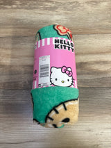 Hello Kitty plush blanket with green and beige pattern, ideal for kids and baby gear