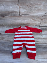 Back flat-lay of newborn Gerber Kansas City Chiefs footless coverall with red and white stripes and red sleeves on wood background