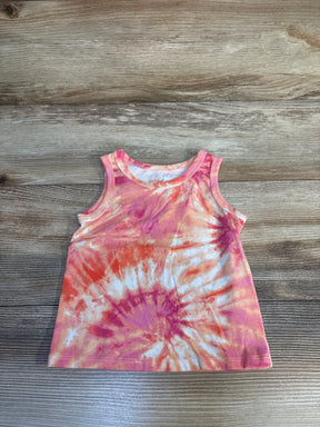 Colorful pink and orange tie-dye sleeveless toddler top on wood background