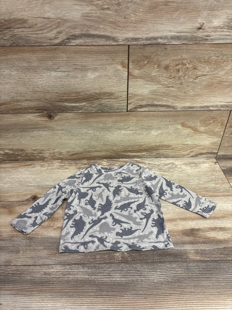 Flat lay of Old Navy gray dinosaur shirt, size 12 to 18 months, showcasing long sleeves on wood grain