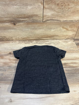 Kids charcoal gray short sleeve t-shirt laid flat on wood background