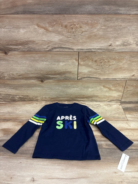 Navy blue Janie & Jack long sleeve toddler shirt with 'Après Ski' text and striped sleeves.