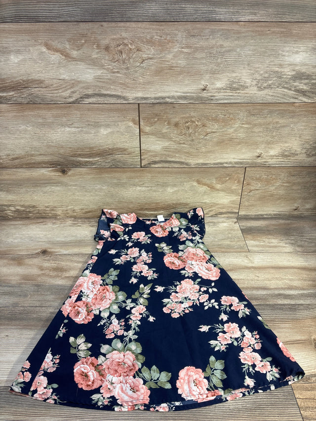 Flat-lay of girl's navy sleeveless floral dress size 5T showcasing pink rose print and flutter sleeves on wood background