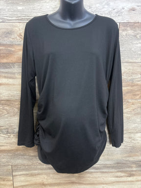 Front view of black Ekouaer maternity long-sleeve shirt with side ruching, on mannequin against wood background