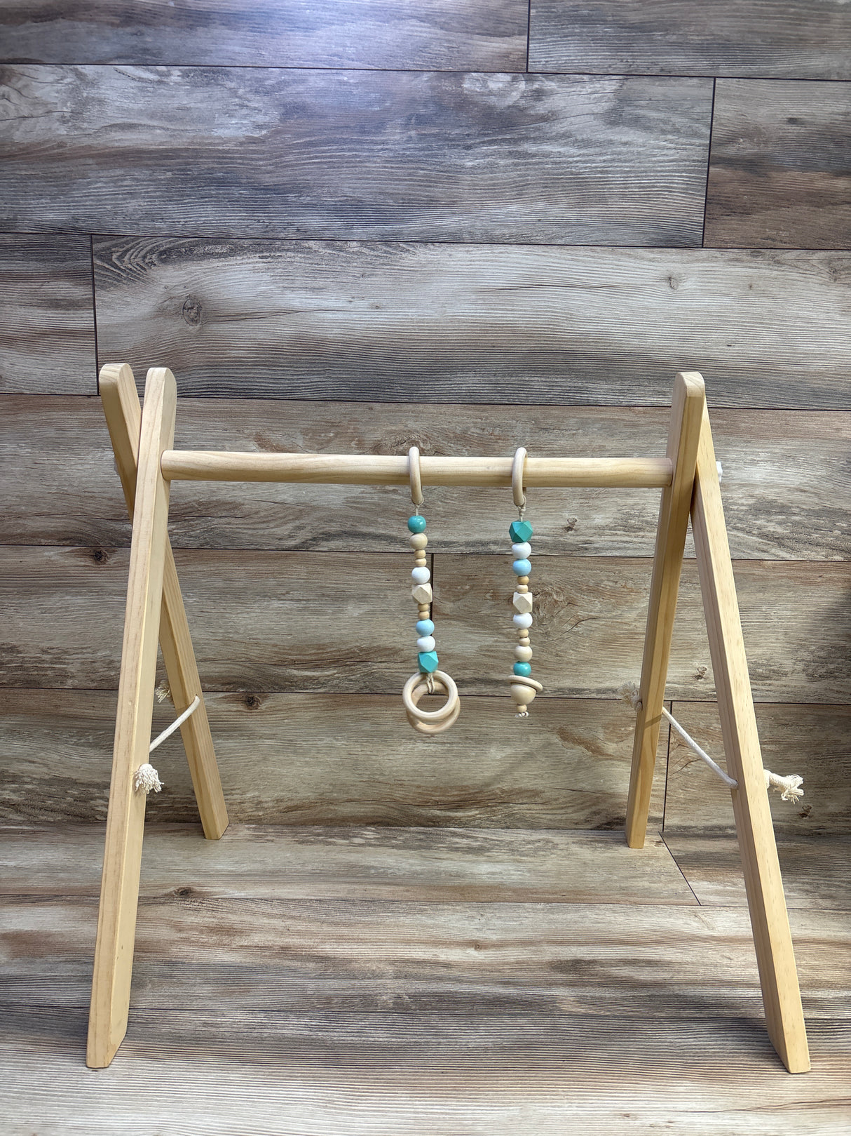 SlickBlue Wooden Play Gym with 2 Hanging Toys