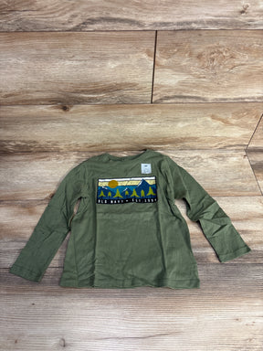Green Old Navy long-sleeve toddler shirt size 4T with mountain and tree graphic on wood background