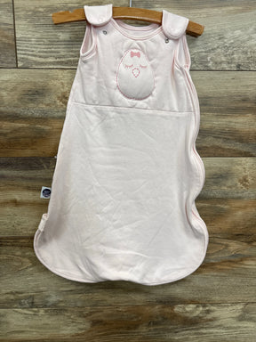 Light pink baby sleeping bag with cute bird embroidery on wood background