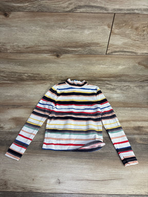 Children's long-sleeve striped mock neck shirt with colorful horizontal stripes on wood floor