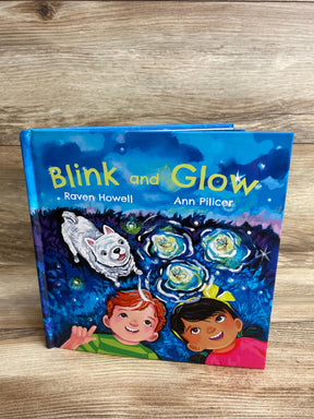 Children’s book Blink and Glow with illustrated kids, dog, and fireflies on wooden background