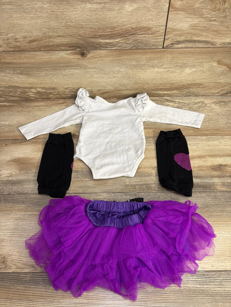 White ruffle onesie with black heart leggings and purple tutu skirt for baby girl