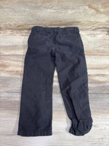 Rear view of grey Oshkosh kids' pants size 3T laid flat on a wooden background.