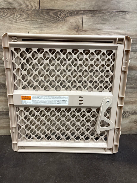 Rear view of Toddleroo by North States Supergate Ergo Classic Gate showcasing lattice panels and latch on a wood floor