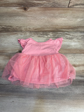 Pink baby girl dress with tulle skirt on wooden background, gently used kids clothing