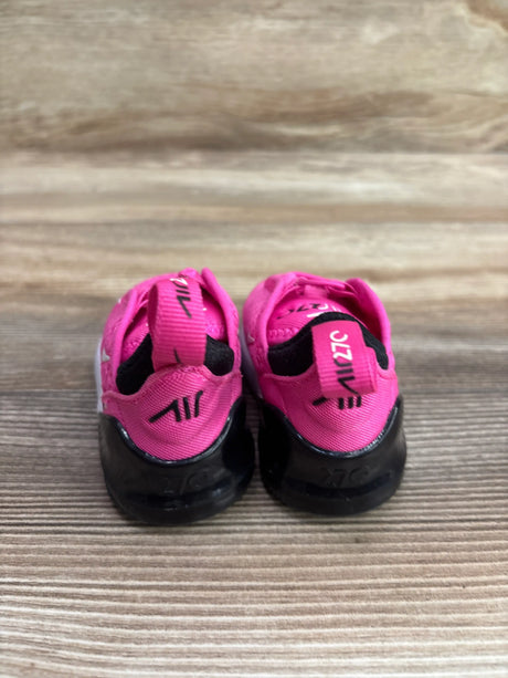 Rear view of Nike Air Max 270 TD Laser Fuchsia sneakers in size 2C showcasing pink uppers and black soles on a wood surface