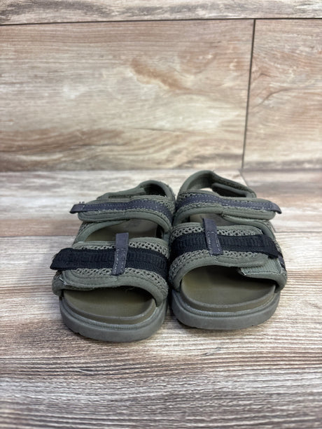 Front view of Zara toddler scuba sandals, green size 7C, showing two Velcro straps and cushioned footbed on wood background