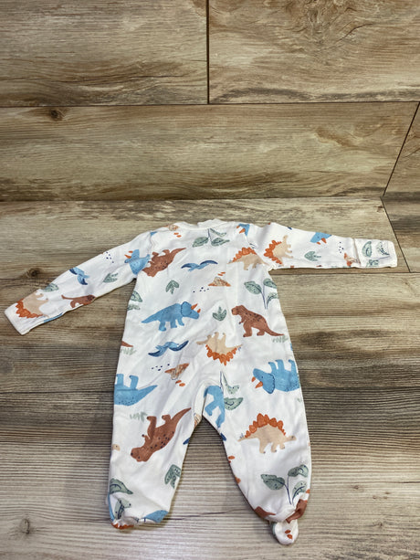 Front view of Carter’s ivory size 3 months sleeper showcasing dinosaur print and footed design on a wood-look floor