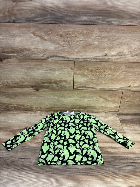 Flat lay of H&M toddler long-sleeve black shirt with glow-in-the-dark green ghost print on wood floor