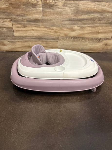 Front view of Chicco Mod Walker Lavender showcasing padded seat and tray with wood-paneled background