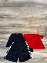 Flat-lay of Member's Only 4-piece toddler shirt and short set showing black shorts with checkered side stripes and a red tee on wood background, size 4T