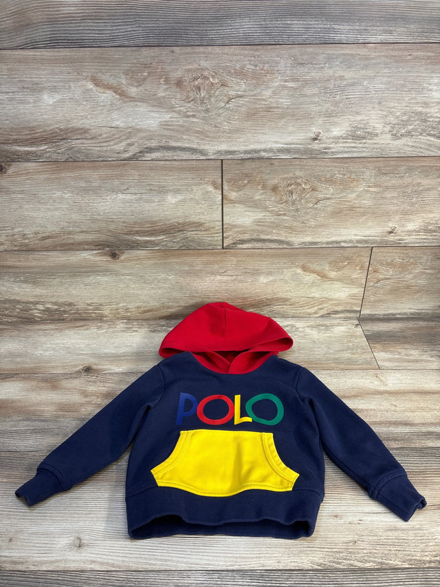 Navy blue kids hoodie with red hood, yellow pocket, and colorful POLO logo, laid on wood floor